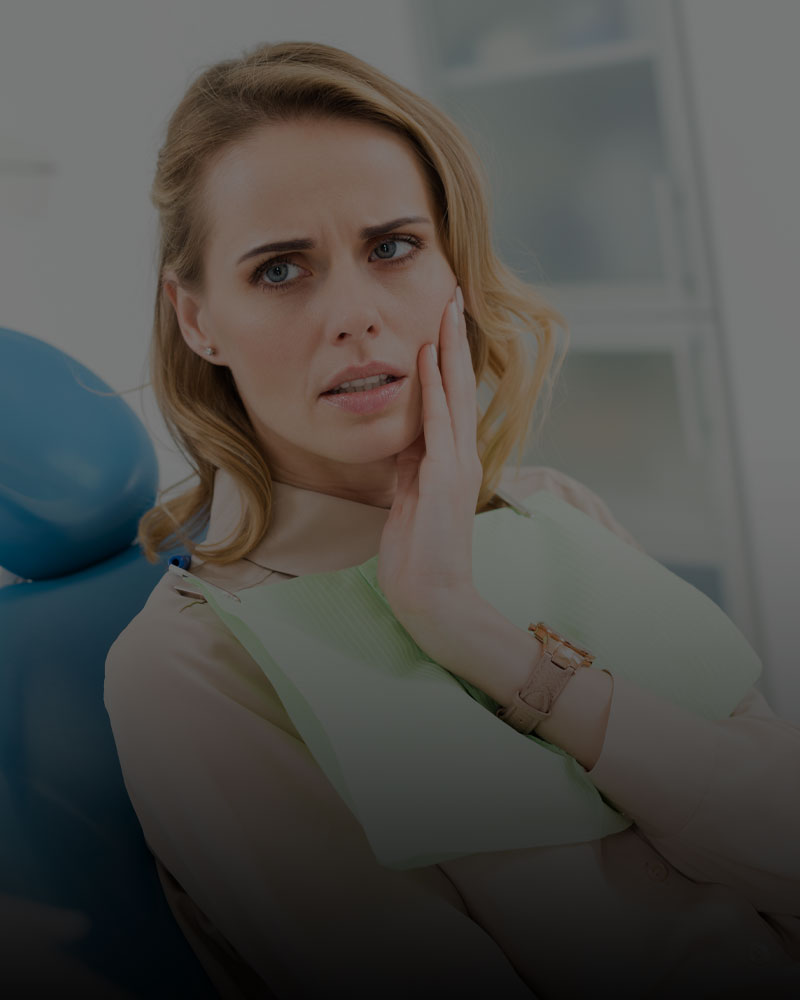 Patient experiencing dental pain